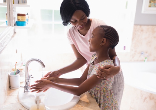 mom and child washing hands